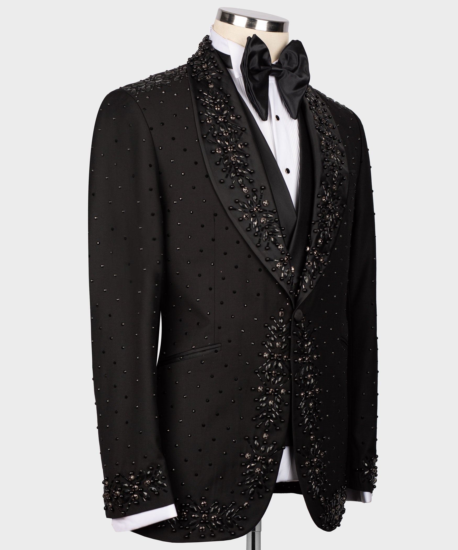 Black tuxedo jacket side view with dotted bead pattern and jeweled lapel appliqués