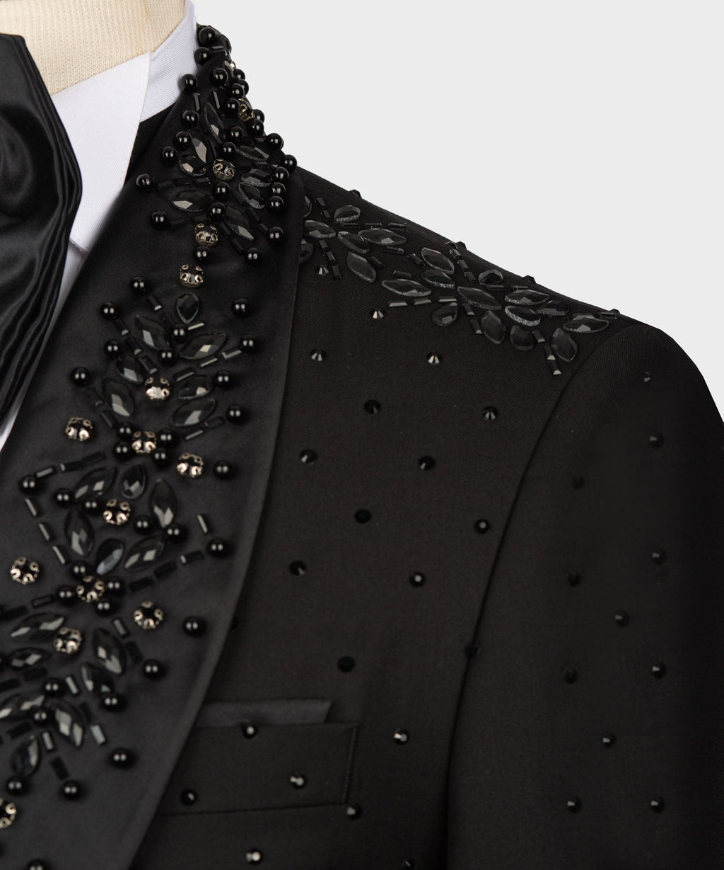 Black tuxedo lapel and chest close-up with bead and rhinestone detailing