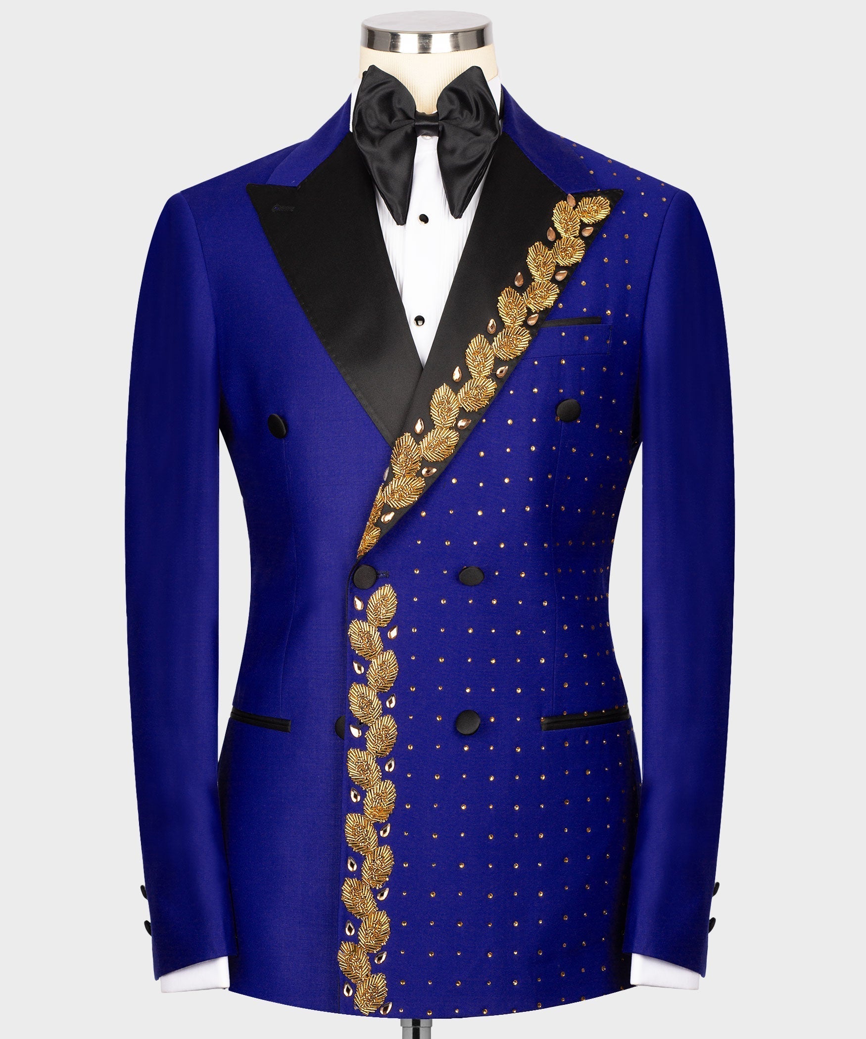 Blue tuxedo jacket with gold embroidered diagonal stripe, black satin bow tie & lapels