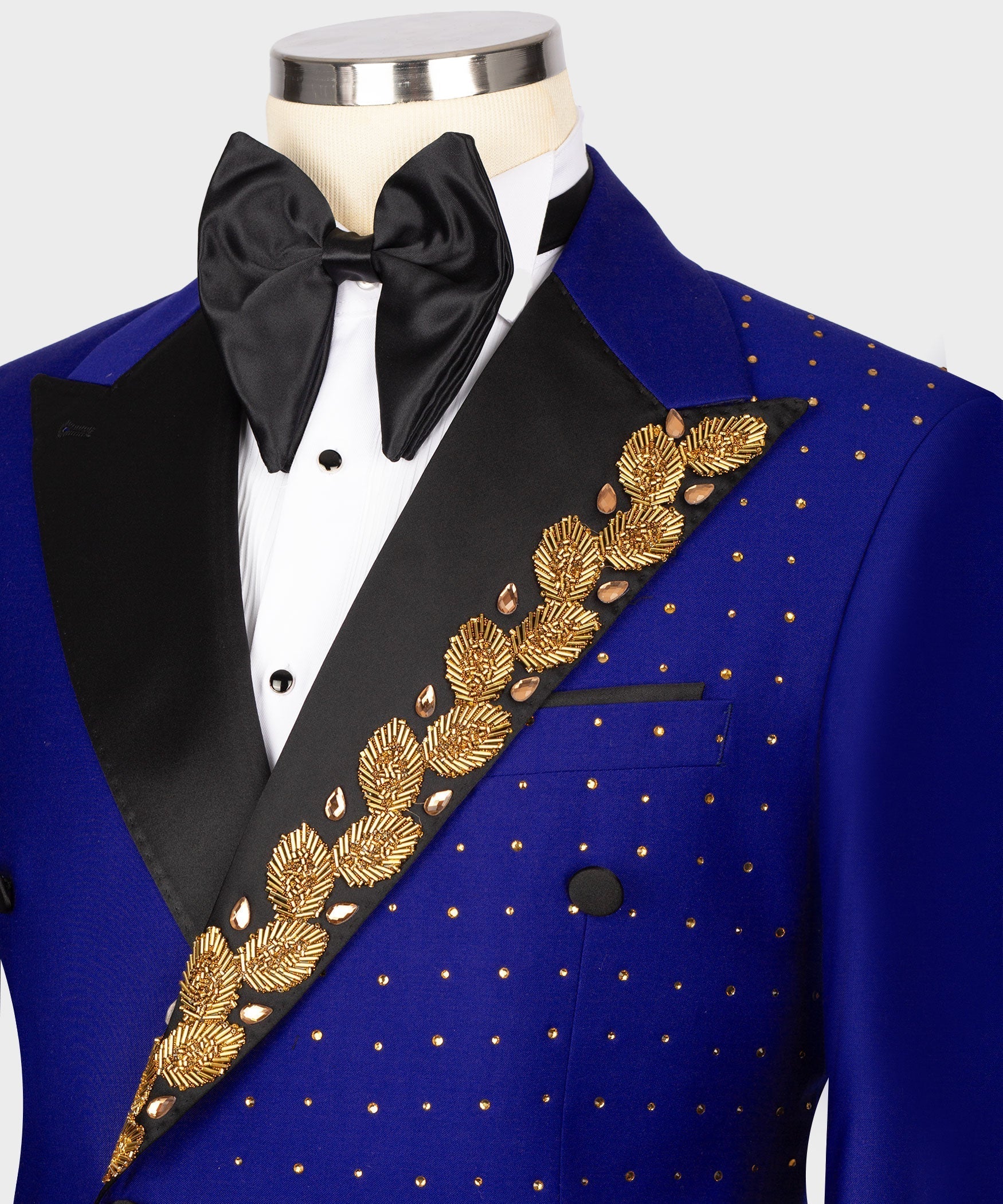 Black bow tie and tuxedo shirt with royal blue jacket, gold embroidered diagonal trim