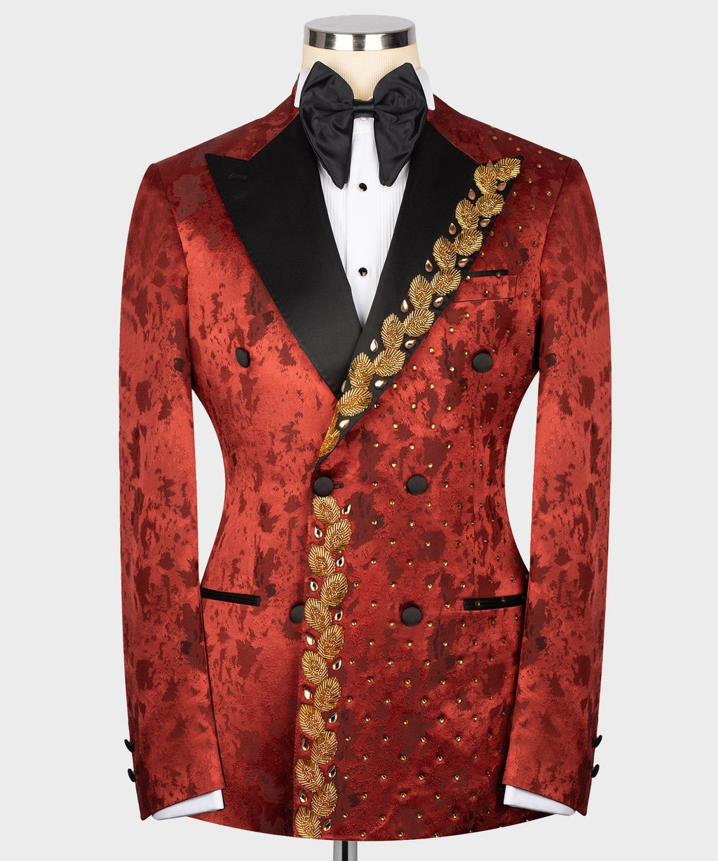 Red patterned tuxedo jacket with black satin lapels and gold embroidered diagonal trim