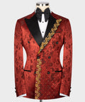 Red patterned tuxedo jacket with black lapels, black bow tie, gold chest embroidery and studs