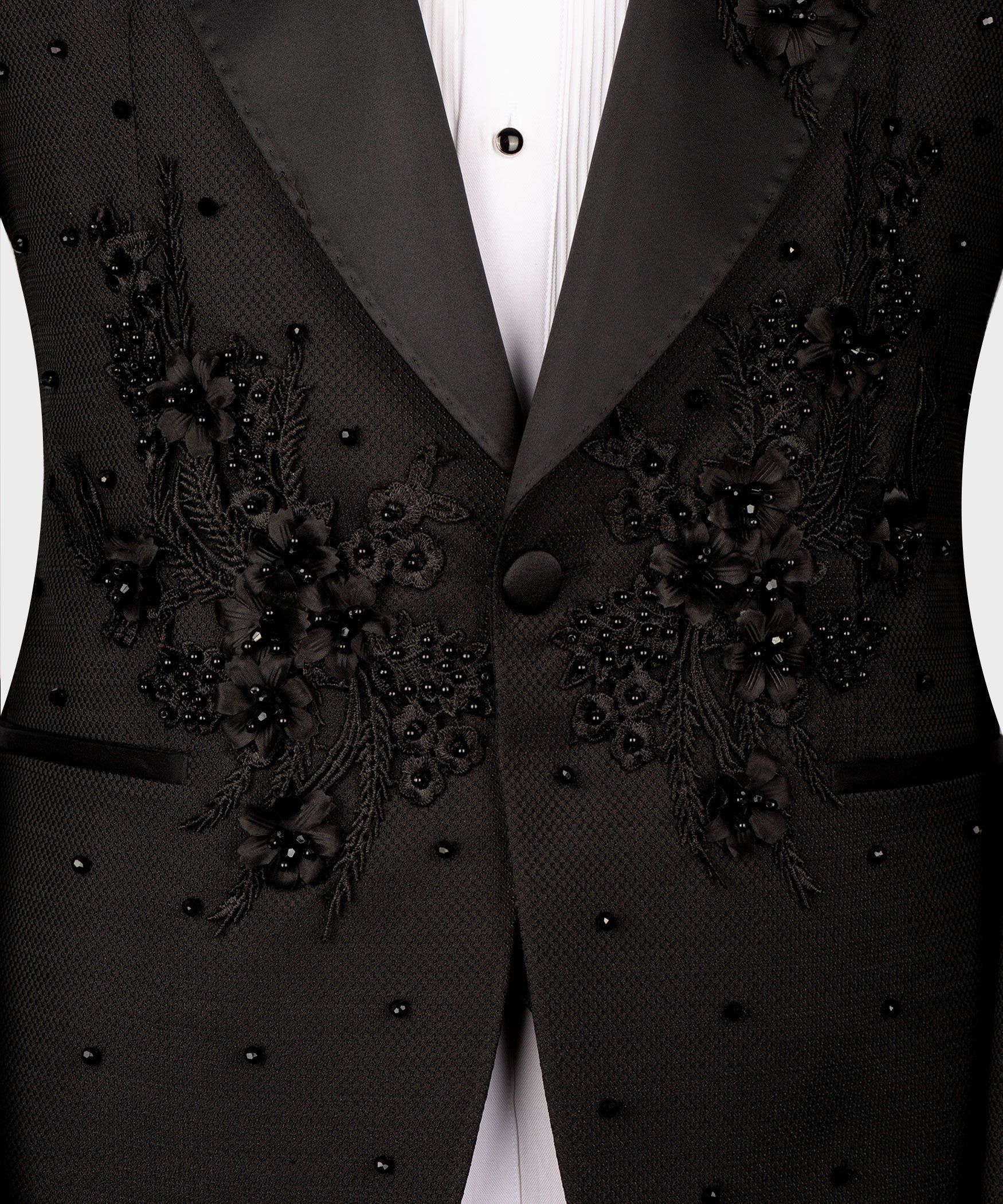 Black tuxedo vest front with center button and dense floral bead embroidery