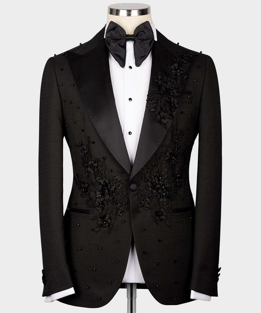 Black tuxedo set: jacket, vest, bow tie, and white dress shirt with floral details