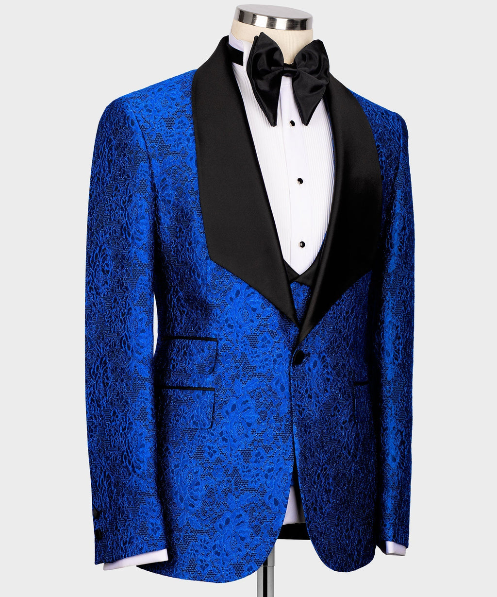 Blue embossed tuxedo jacket and waistcoat with black satin lapels and bow tie