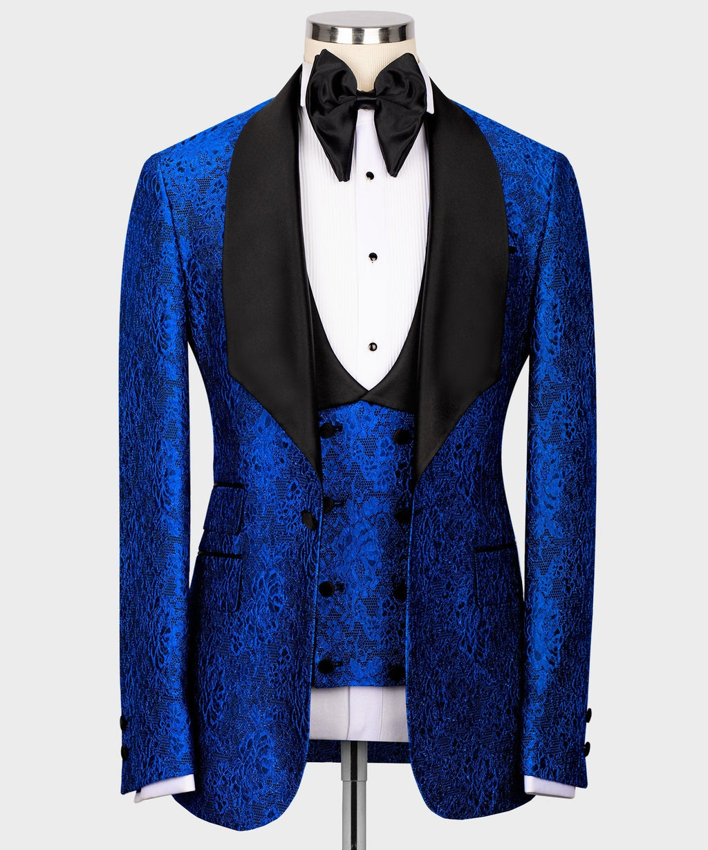 Blue embossed tuxedo jacket with black satin lapels, matching waistcoat and bow tie