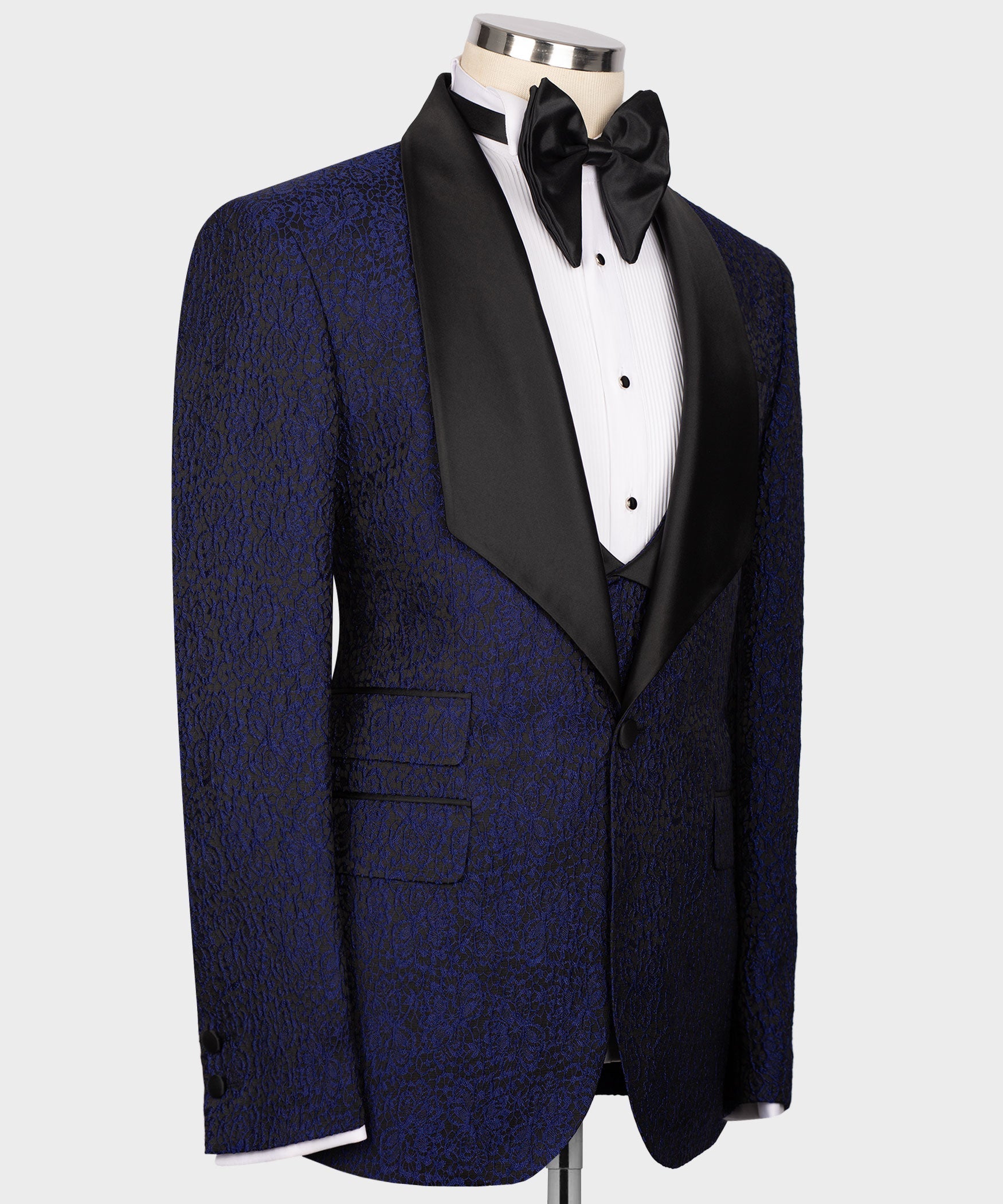 Navy embossed tuxedo jacket and vest, black satin accents, three-button vest styling