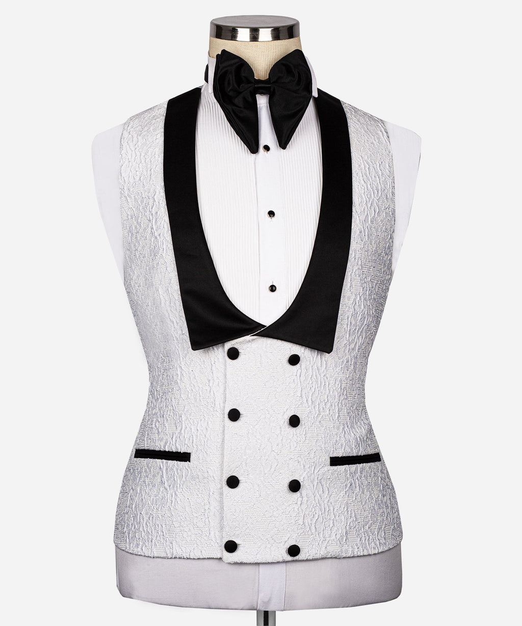 Embossed black-trim waistcoat front with double button row and tuxedo studs
