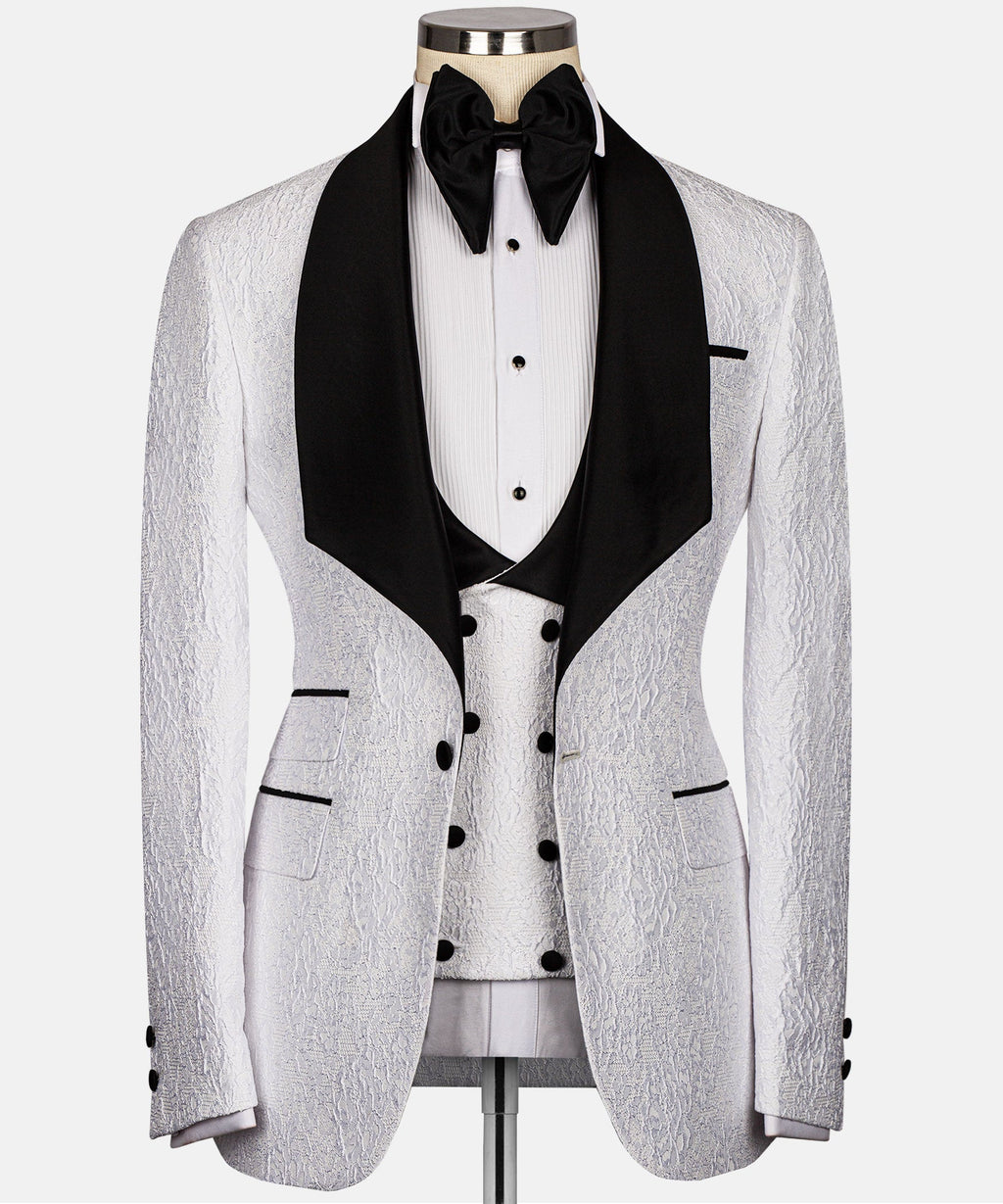 White and black embossed tuxedo jacket with satin black lapels and bow tie