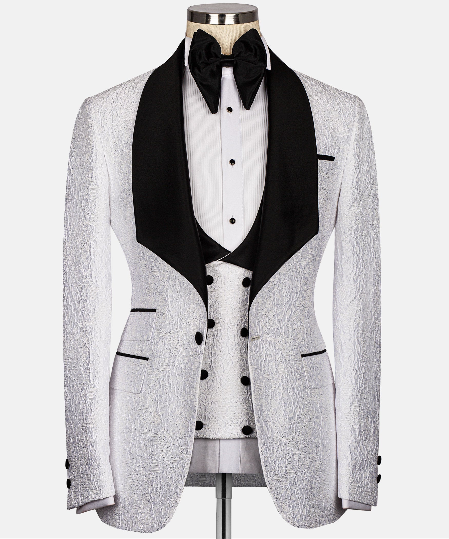 White and black embossed tuxedo jacket with satin black lapels and bow tie