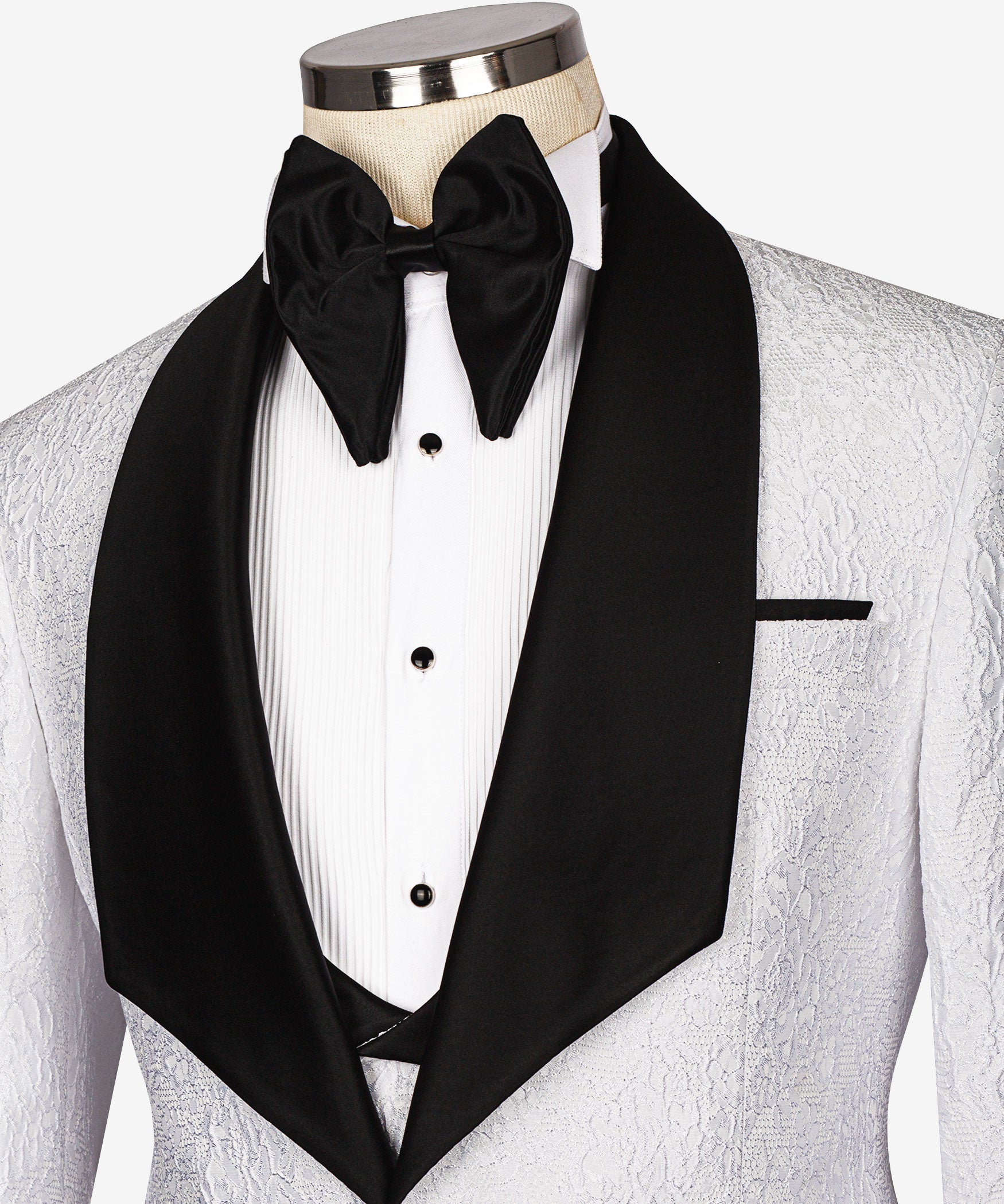 Embossed tuxedo shirt and vest details with black satin bow tie and lapels
