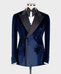 Blue velvet double-breasted tuxedo jacket with black satin lapels and bow tie