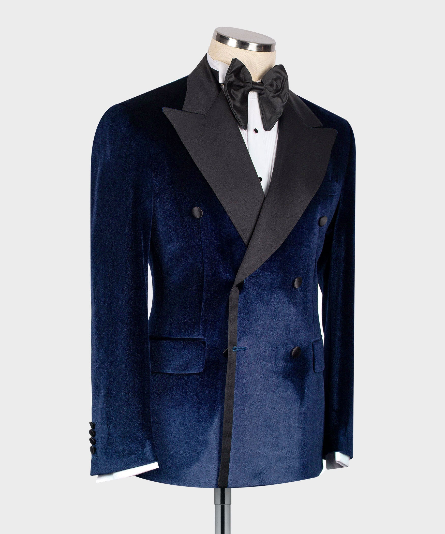 Blue velvet double-breasted tuxedo jacket with black satin lapel and button front