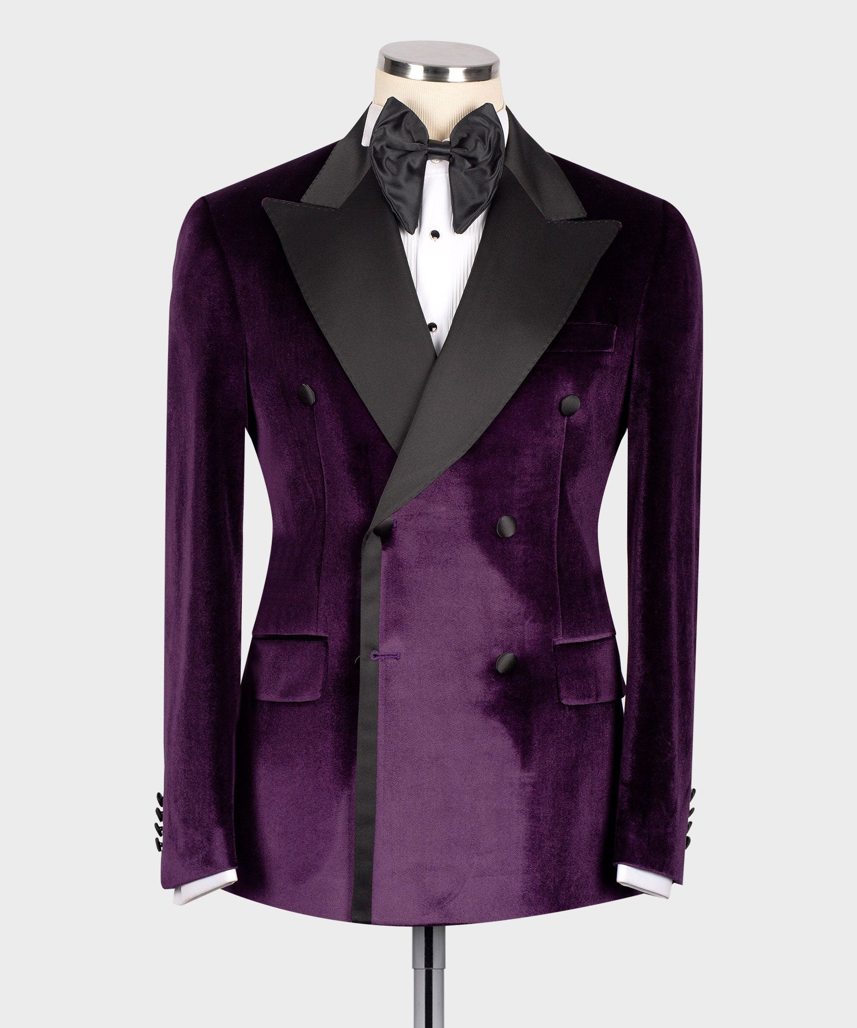 Purple velvet double-breasted tuxedo jacket with black satin lapels and bow tie