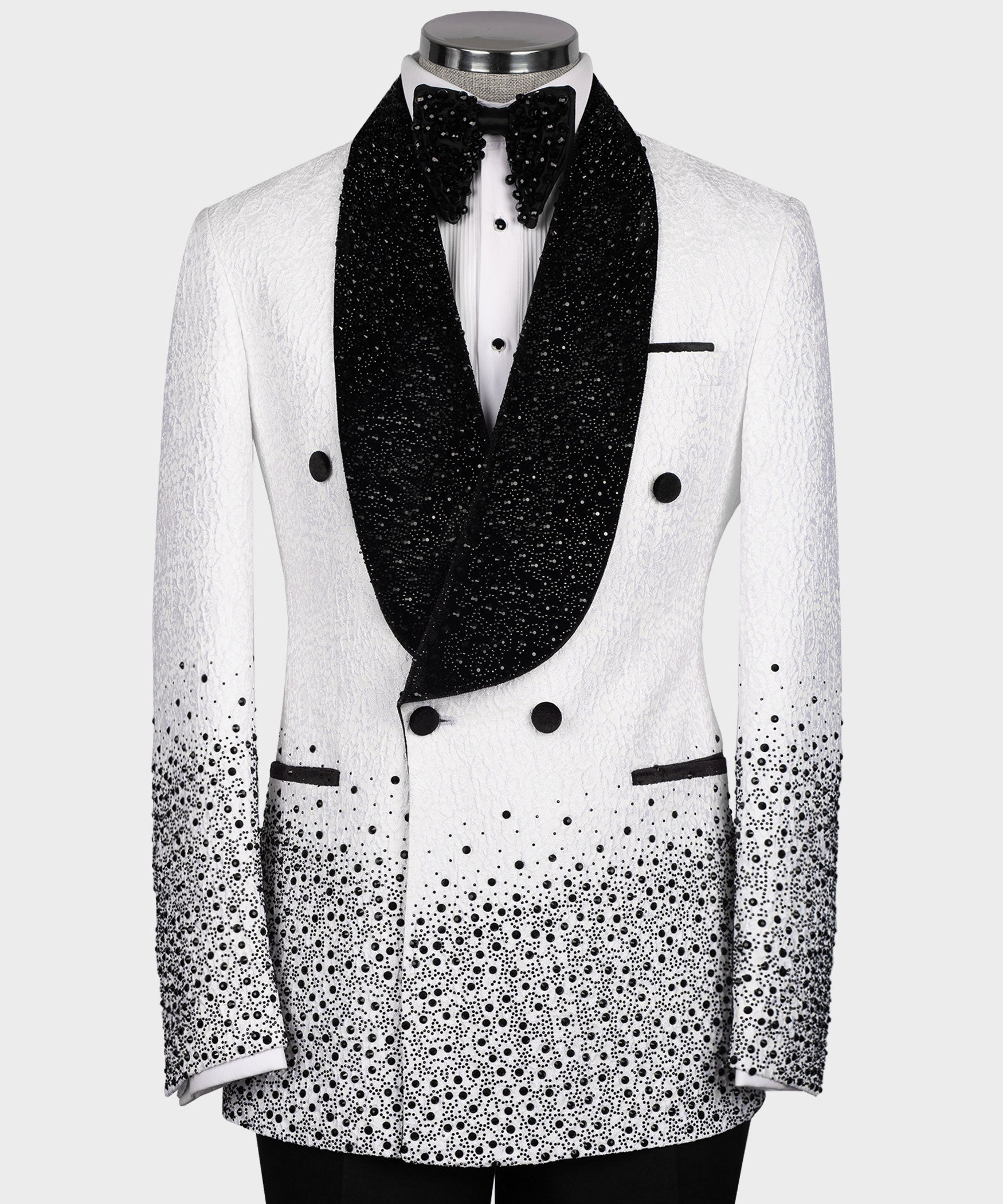 White tuxedo jacket with black stone-embroidered shawl lapels and bow tie detail