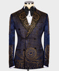 Blue tuxedo jacket with gold grid embroidery, ornate swirl motifs, black bow tie