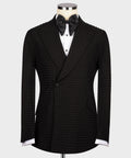 Black stone-embroidered tuxedo jacket with satin bow tie and white dress shirt
