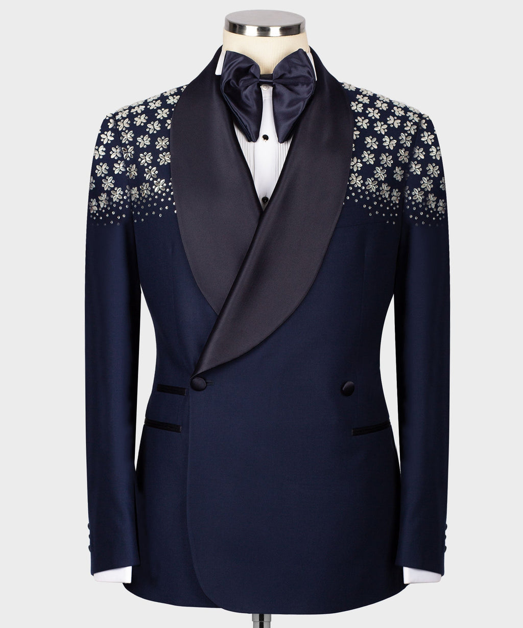 Blue tuxedo with floral stone embroidery on lapels and satin bow tie
