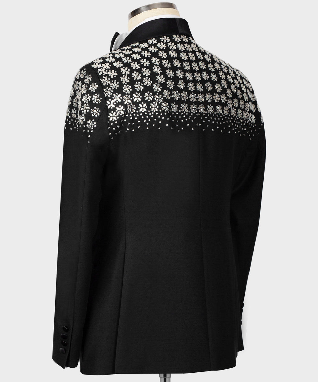 Black tuxedo jacket back with floral stone embroidery across shoulders and upper back