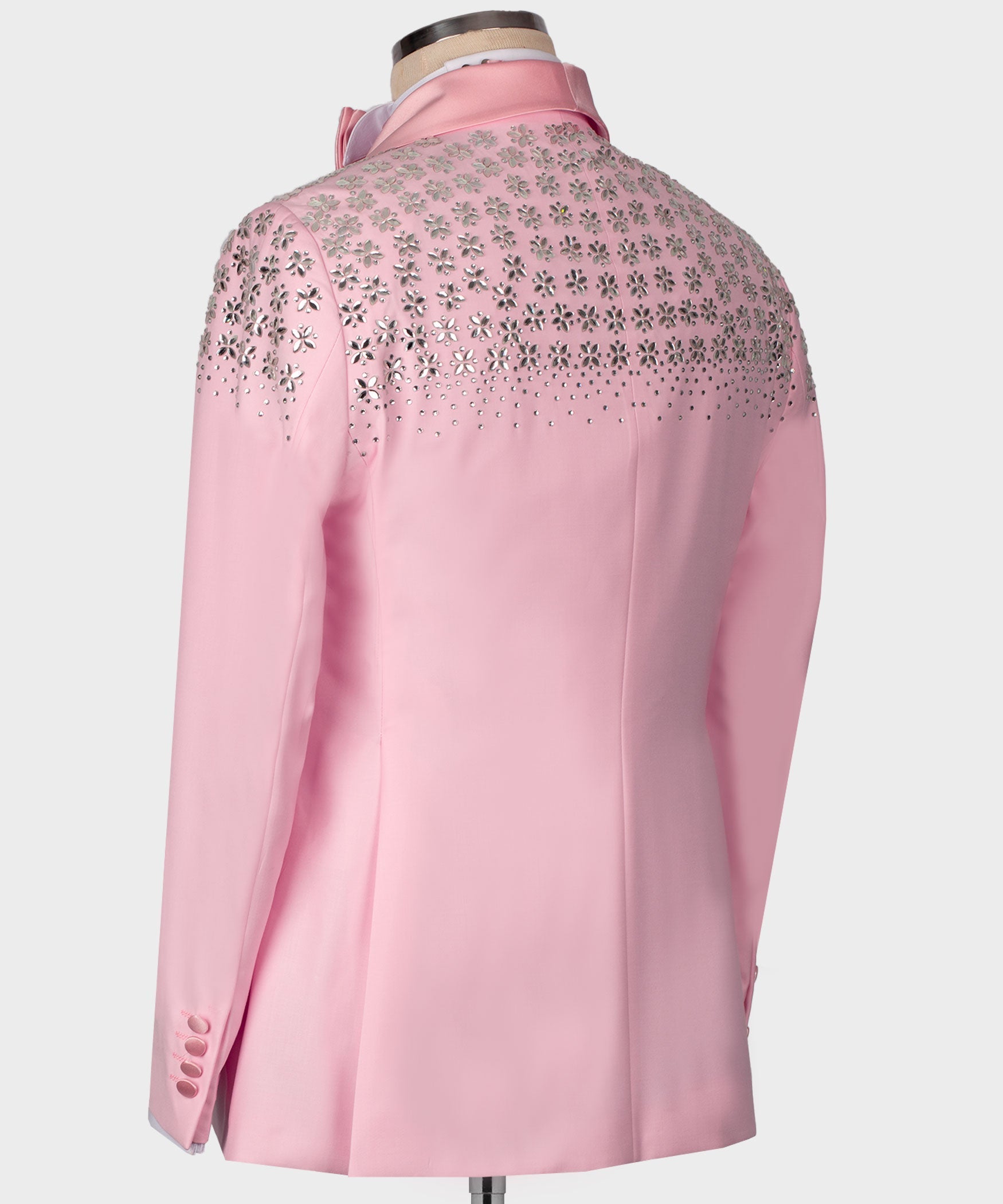 Pink satin tuxedo jacket back with detailed stone embroidery across shoulders