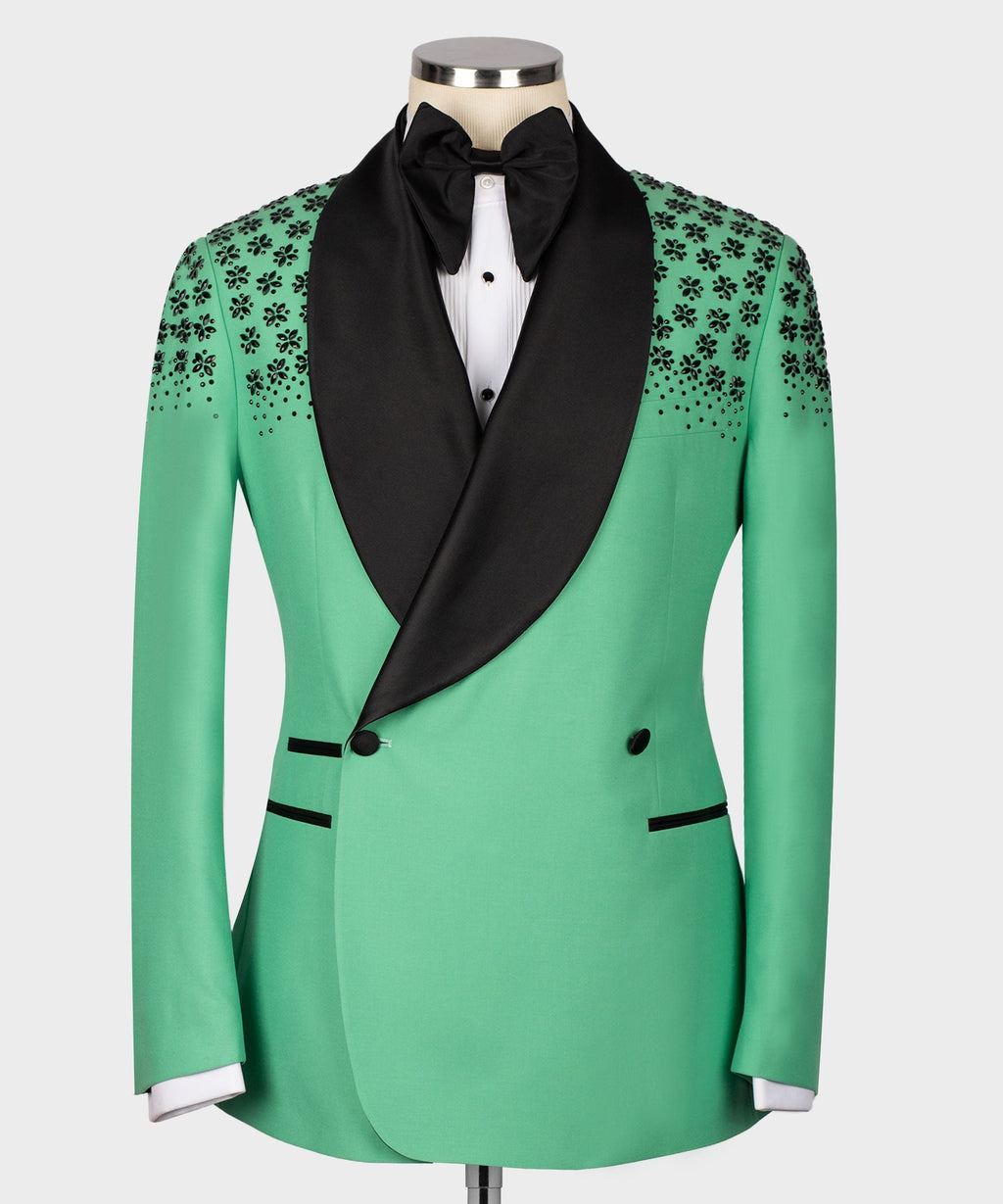 Light green silk tuxedo jacket with black shawl lapels, stone floral embroidery, bow tie.