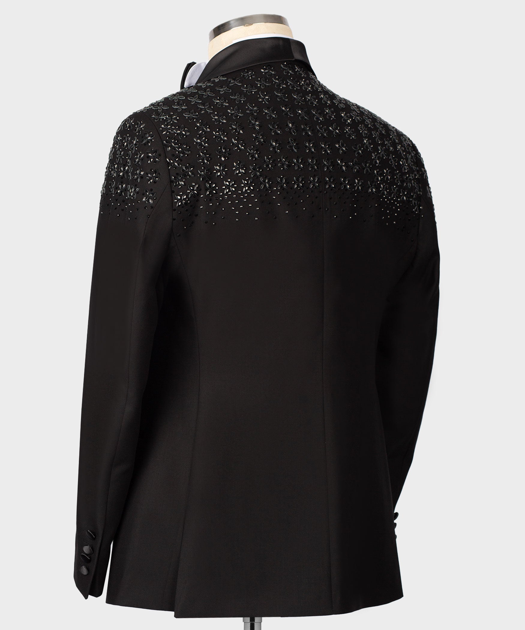 Black tuxedo coat back with allover stone-embroidered texture