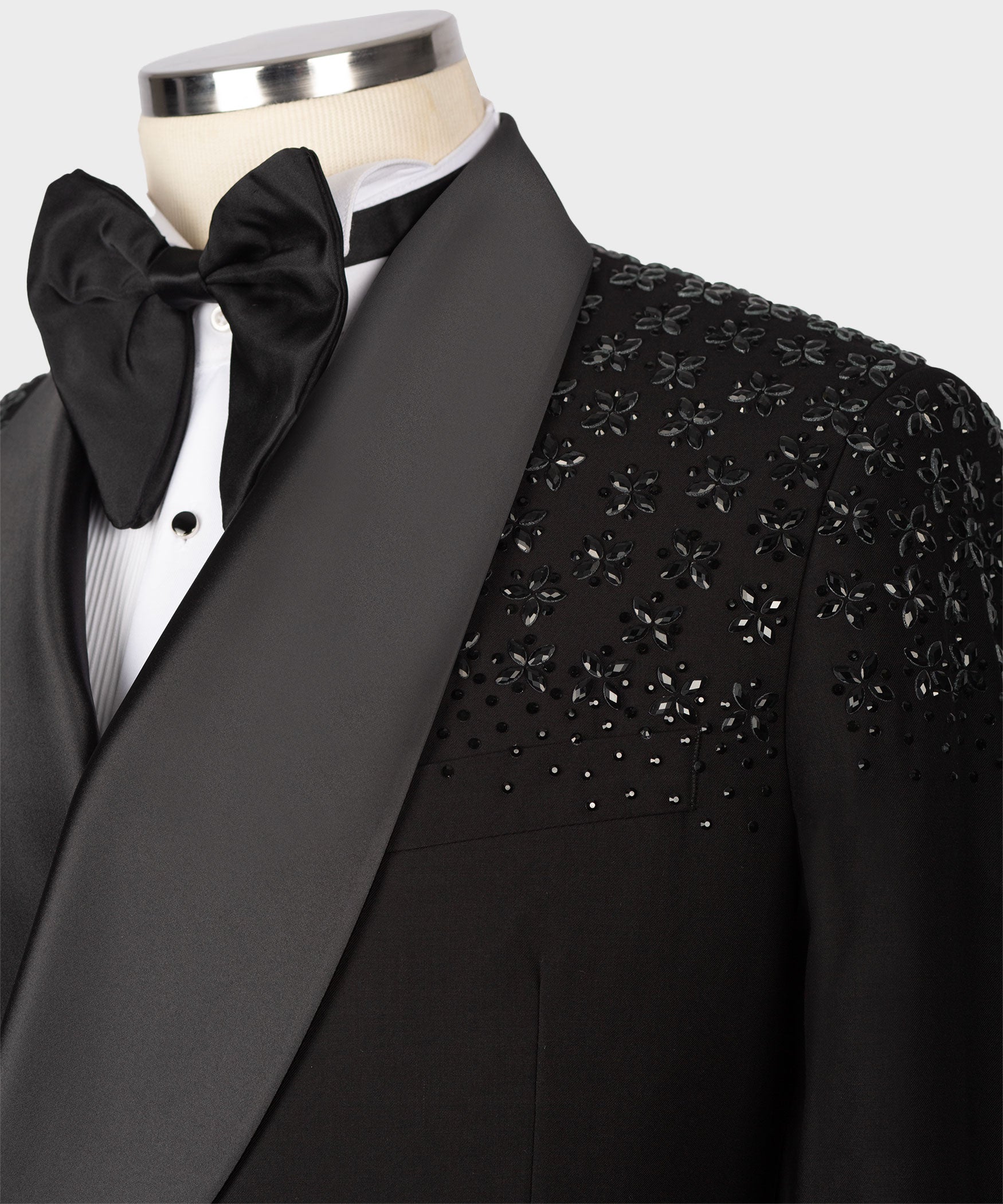 Black satin tuxedo lapel with stone embroidery and large bow tie