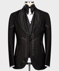 Black tuxedo suit jacket with black embroidered beaded trim and satin bow tie