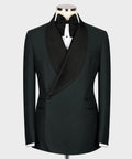 Green tuxedo jacket with black satin shawl lapels and bow tie, front view