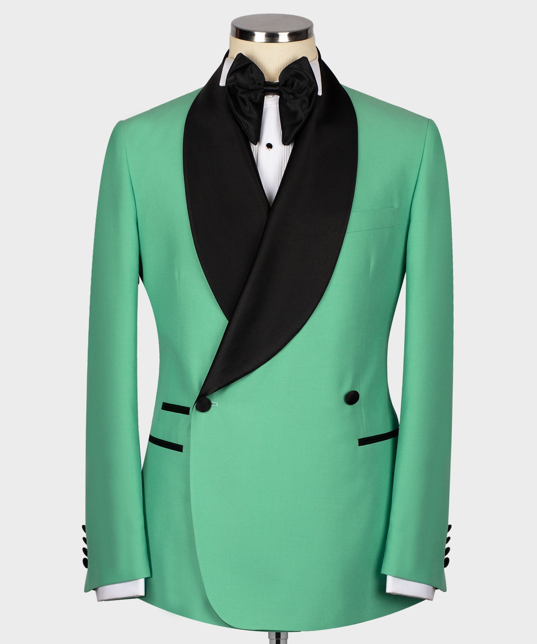 Front green tuxedo jacket with black shawl lapel and satin-covered button