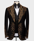 Black tuxedo jacket with gold stone embroidery, satin lapels and bow tie