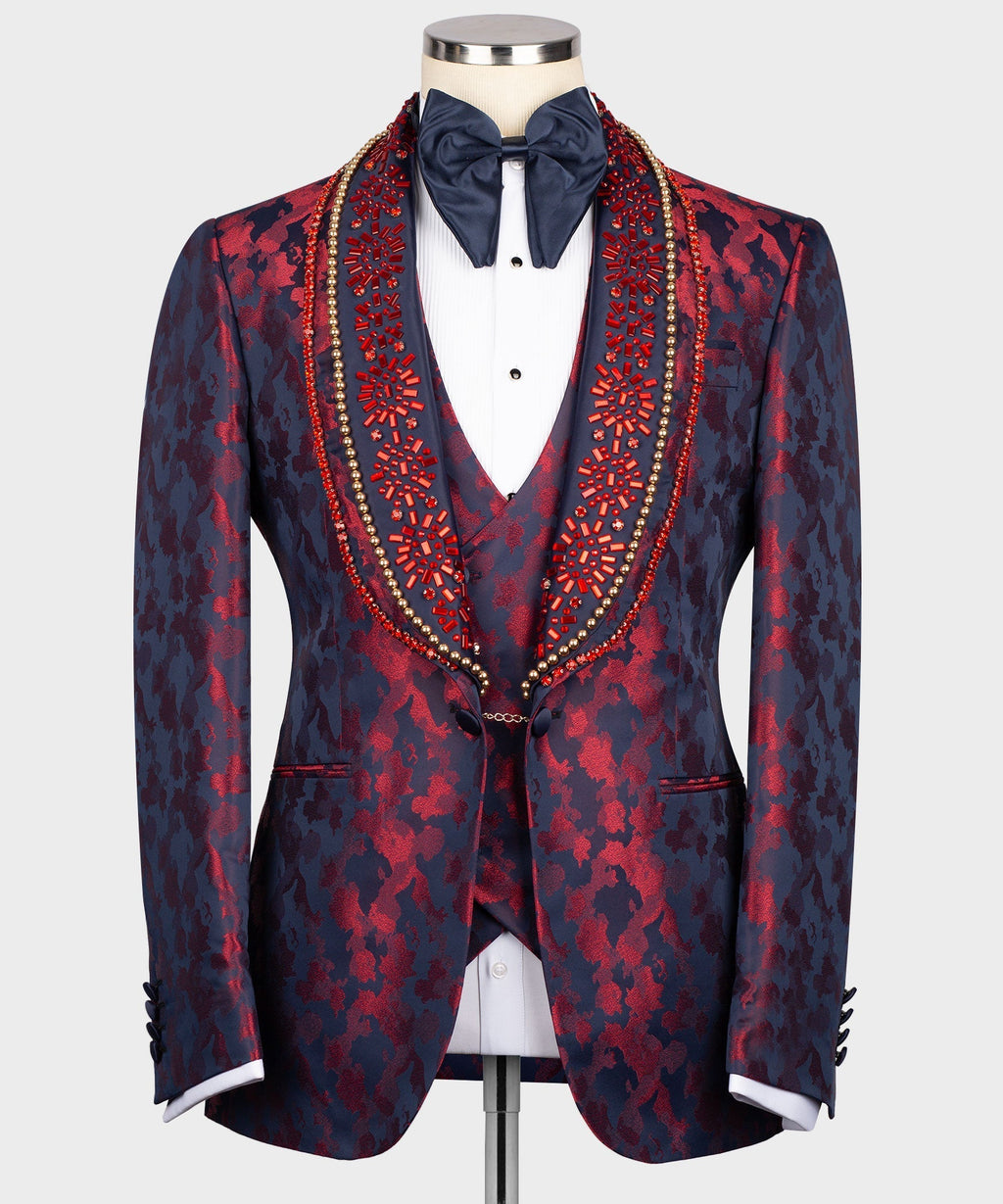 Navy tuxedo jacket with red patterned lapels, white shirt, navy bow tie