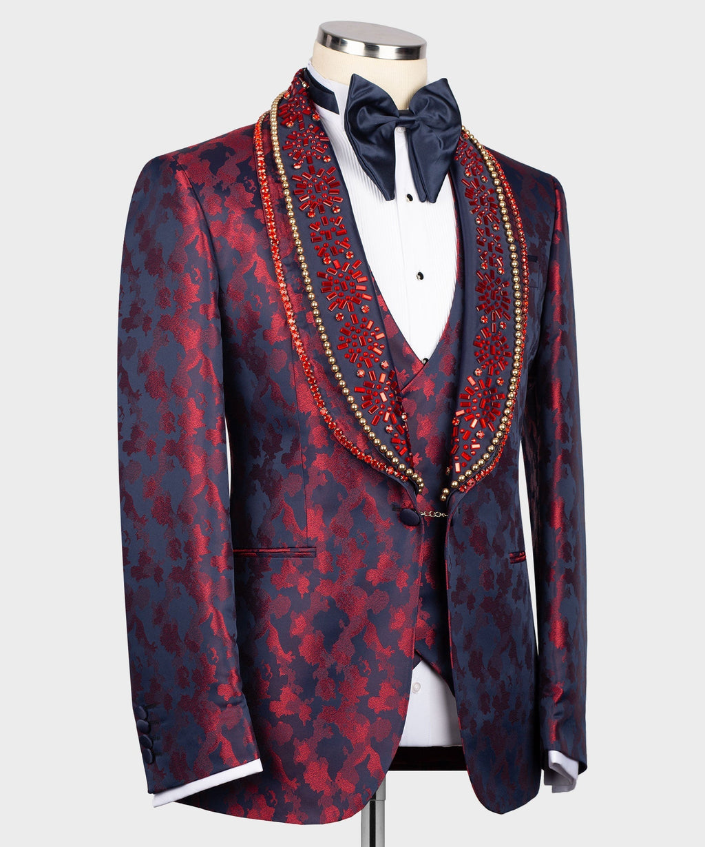 Navy tuxedo jacket with red pattern, decorative beaded trim, white shirt & bow tie