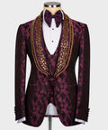 Stone-embellished tuxedo jacket with bow tie, white shirt, gold trim on burgundy print