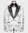 White tuxedo jacket with black satin lapels, bow tie, and rhinestone trim front