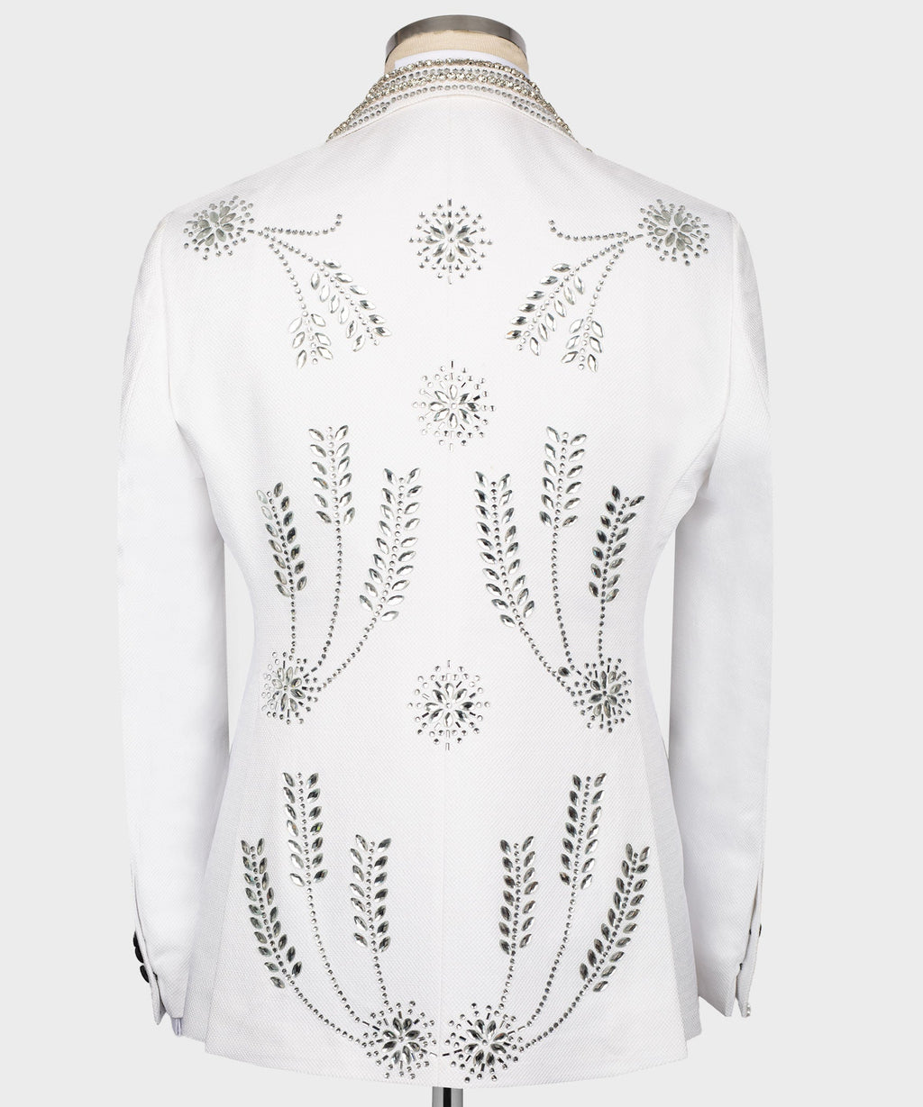 White tuxedo jacket back view with scattered rhinestone floral and leaf motifs