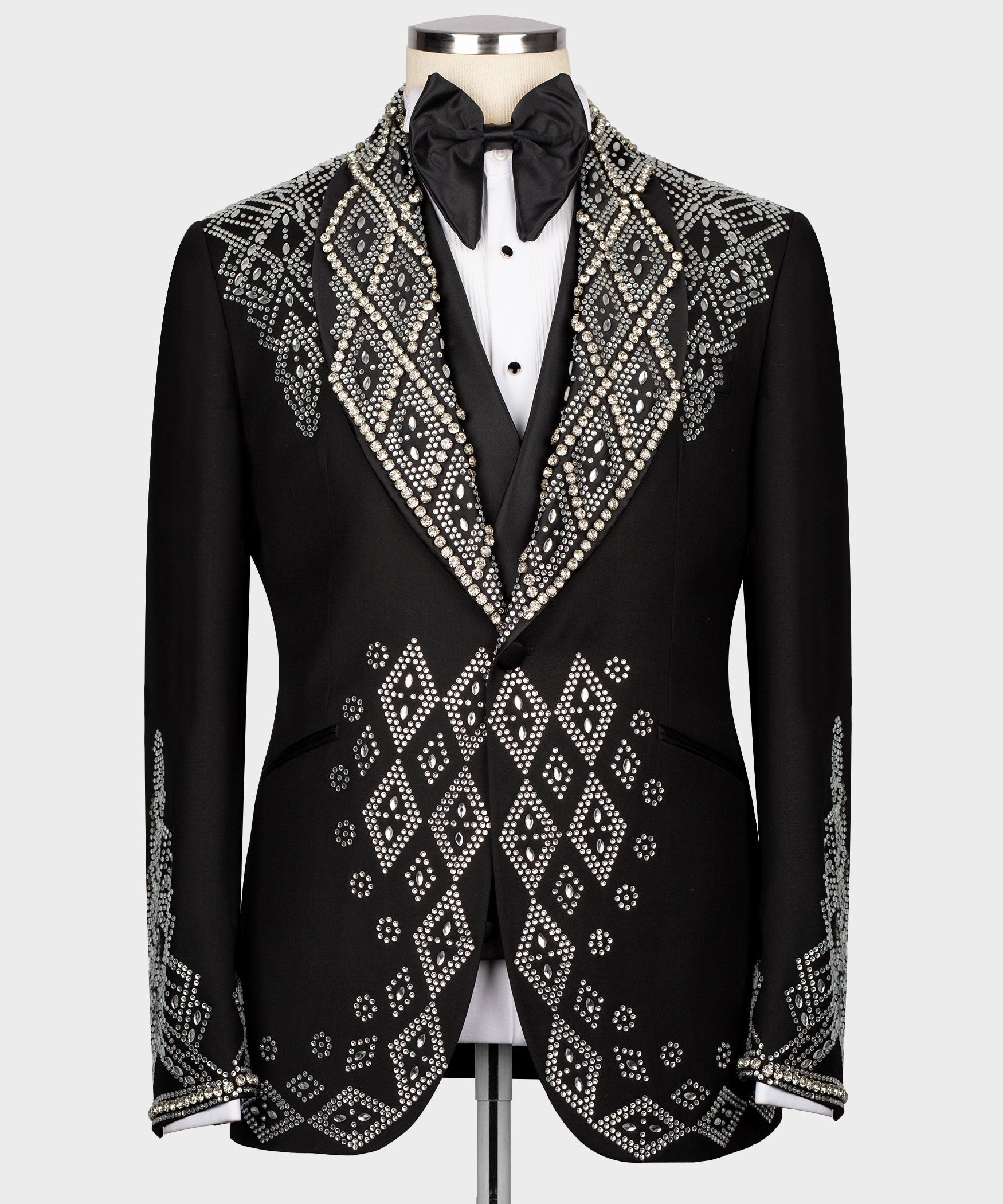 Black tuxedo jacket with rhinestone-embroidered lapels and diamond motif, bow tie