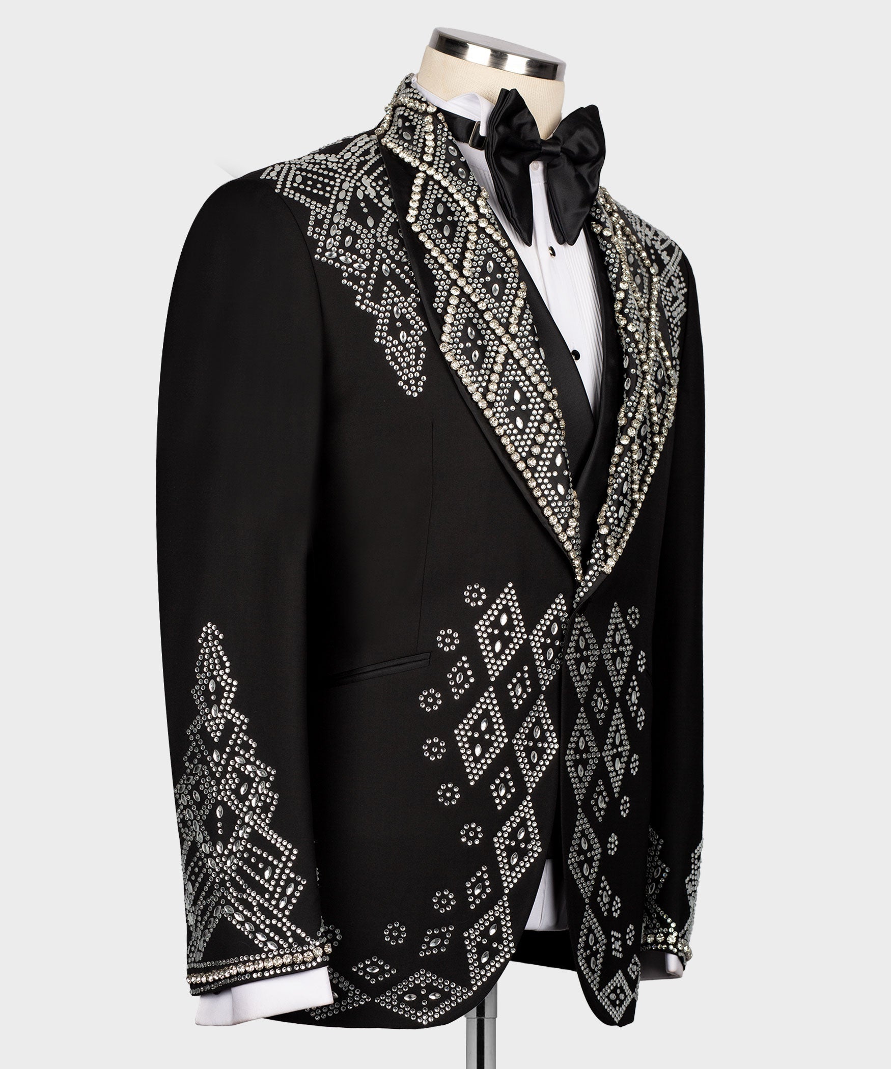 Black tuxedo jacket side view with rhinestone diamond embroidery along the lapel