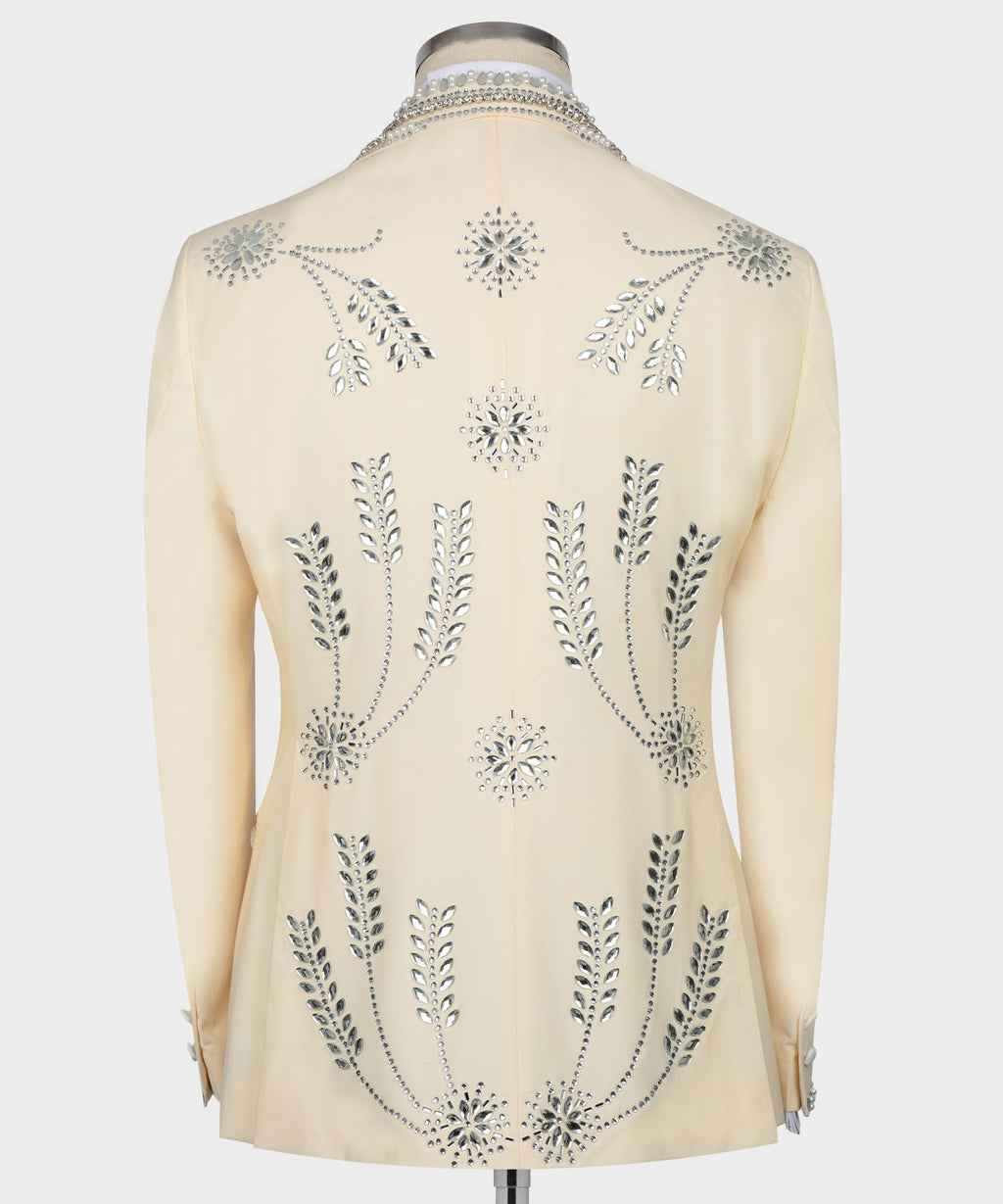 Cream tuxedo jacket back view with gemstone embroidered florals and trailing vine design
