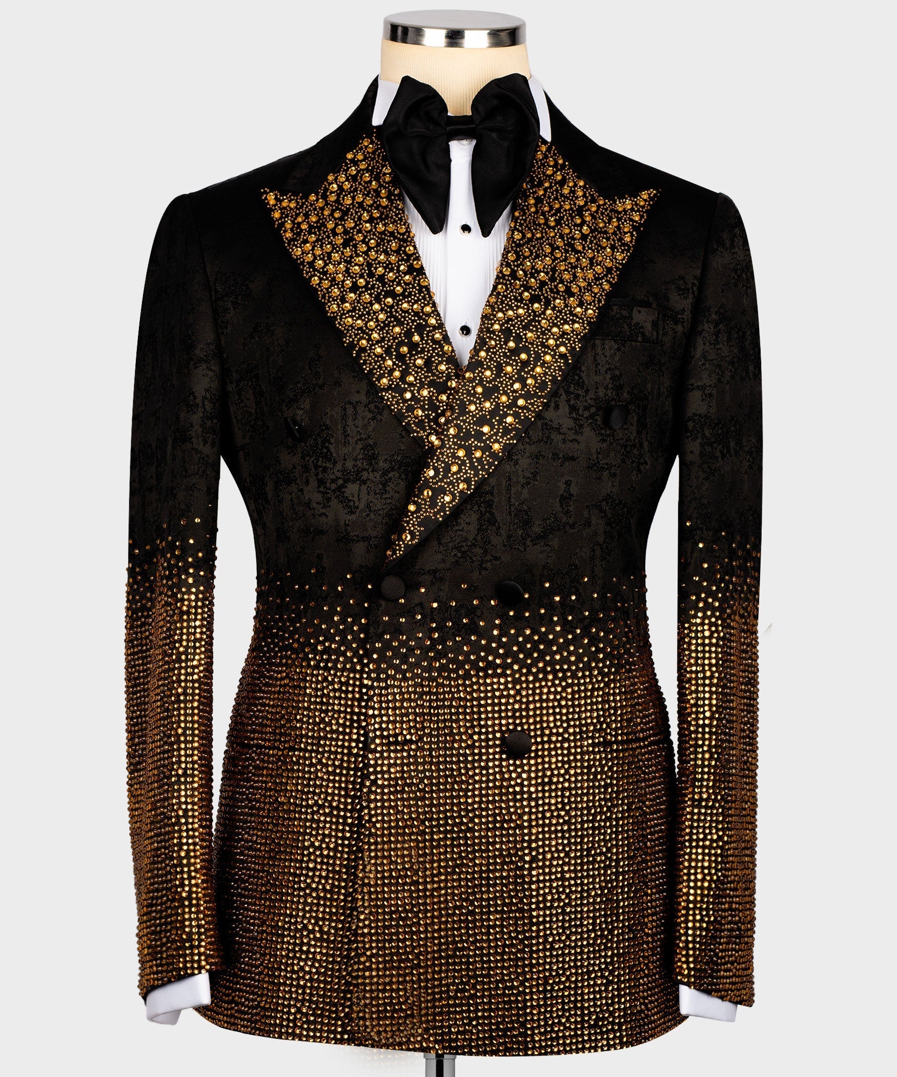 Black tuxedo jacket with gold gemstone-embellished shawl lapel and buttoned front