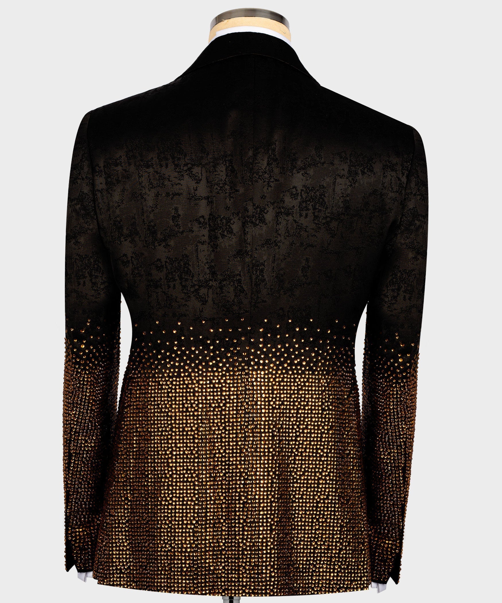 Back view: black tuxedo jacket with gold gemstone-embellished lower half
