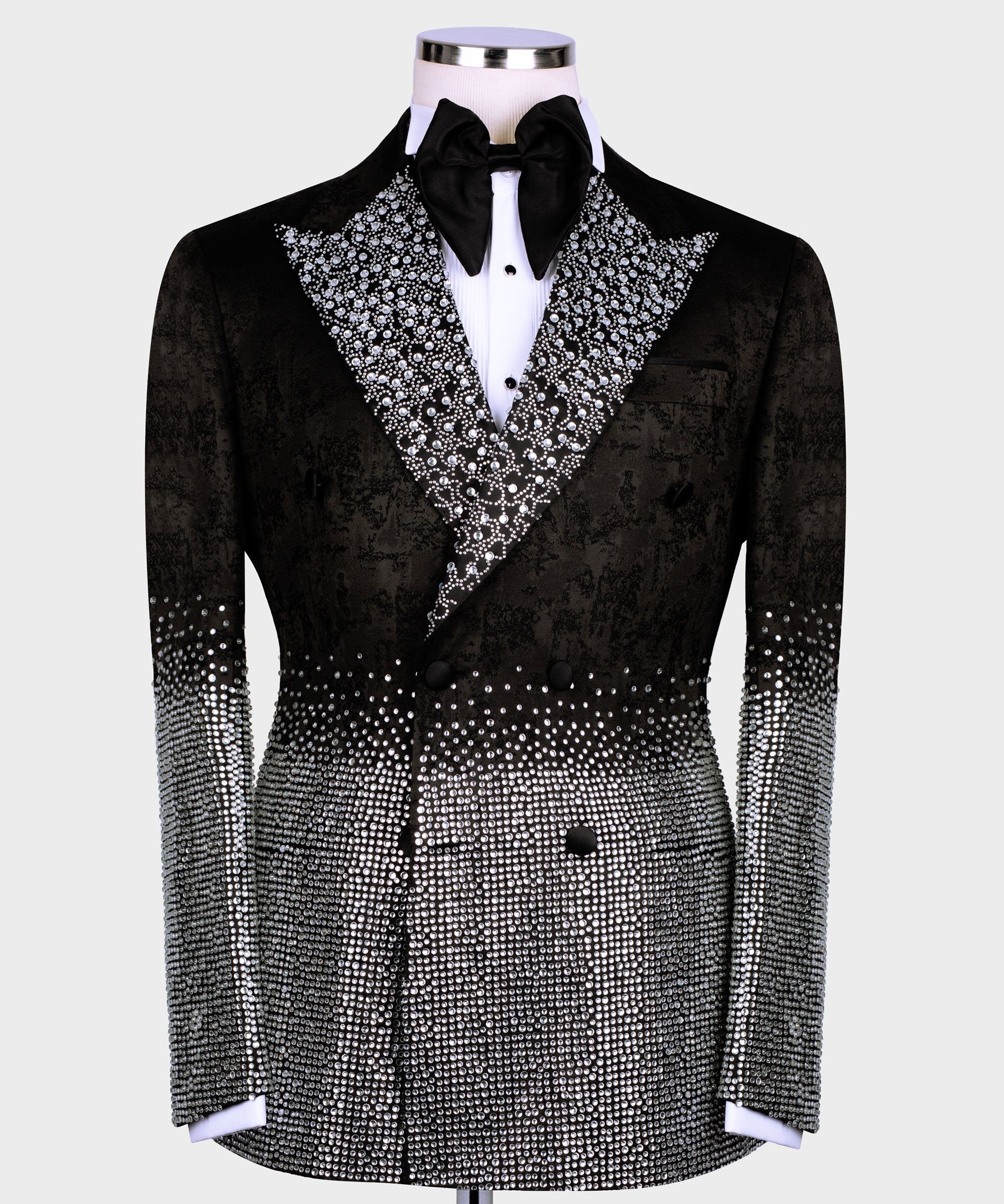 Black tuxedo jacket with silver gemstone-embroidered peak lapels and satin bow tie