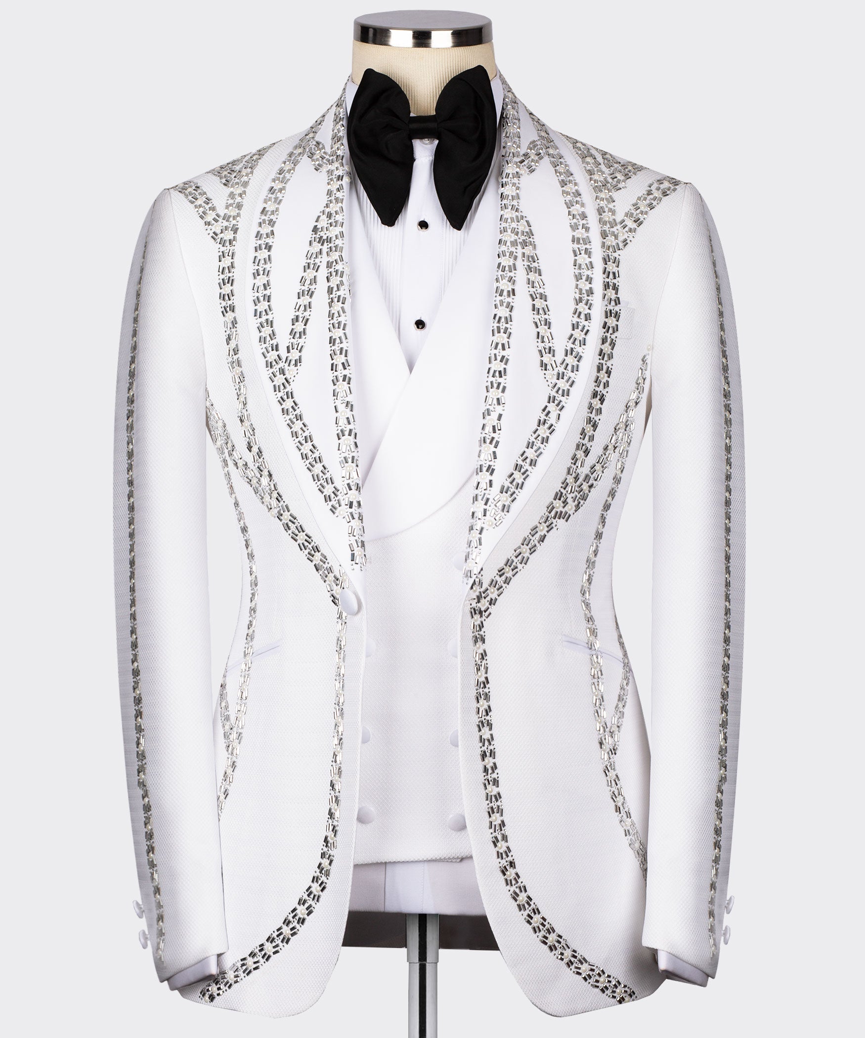 White tuxedo jacket with silver-toned embroidered front, satin lapels, black bow tie