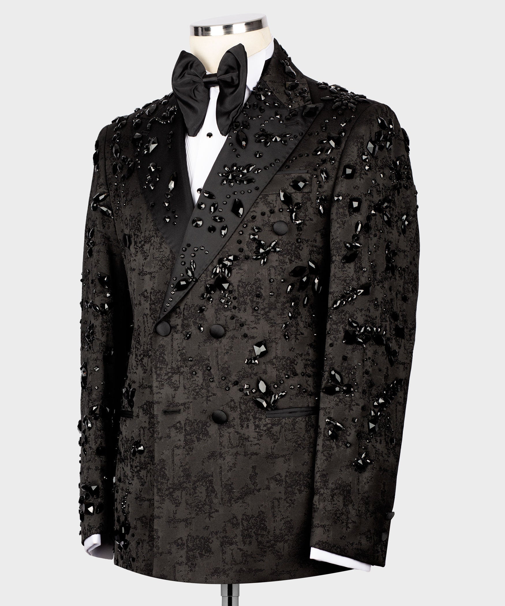 Black tuxedo jacket, bow tie front, scattered jeweled embellishments