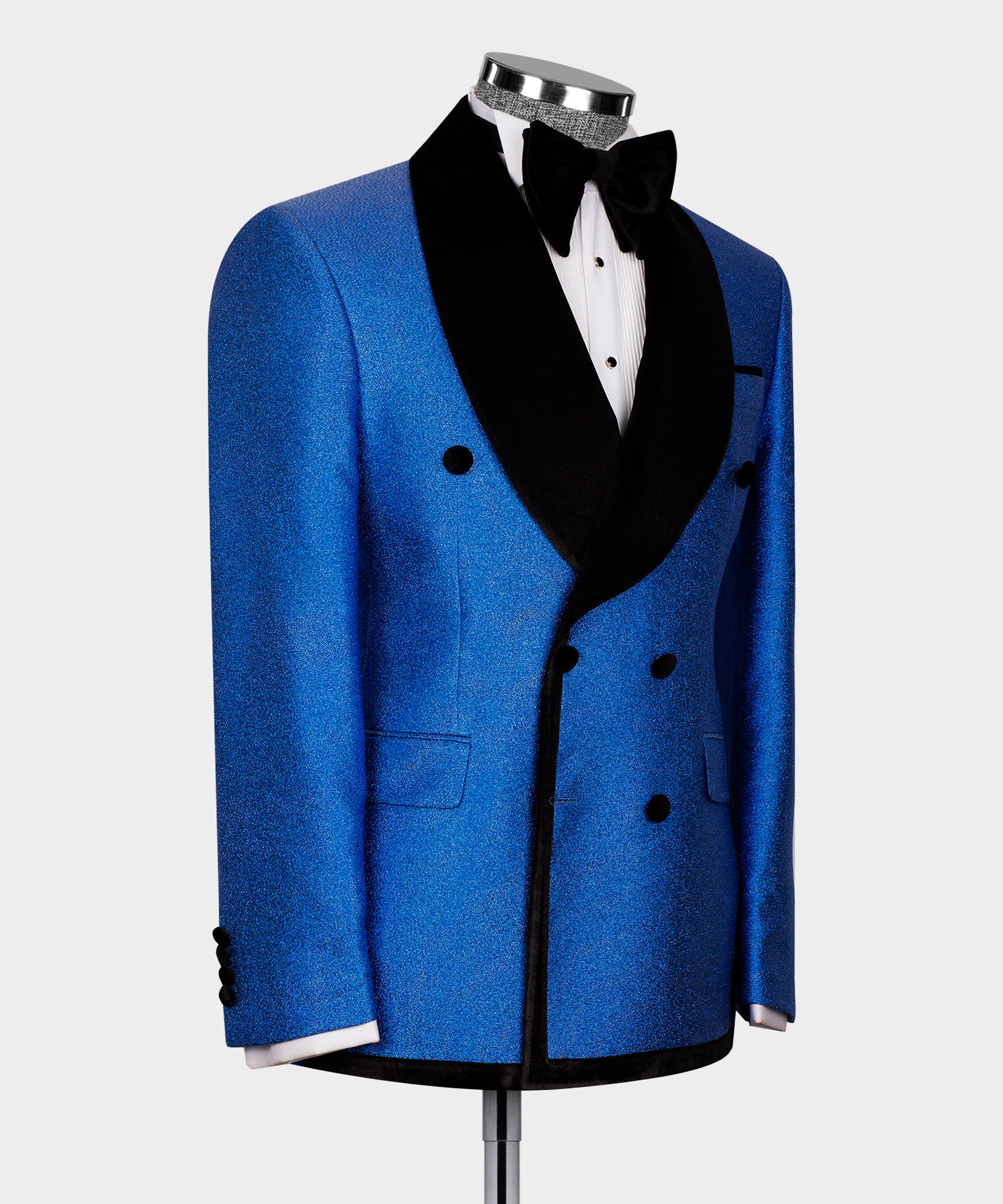 Front view blue velvet double-breasted blazer with black shawl lapels and dark buttons