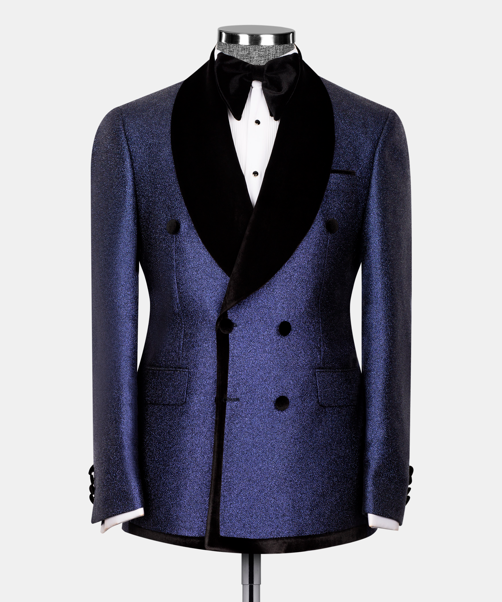 Dark blue double-breasted suit jacket with velvet shawl lapels, black bow tie and waistcoat