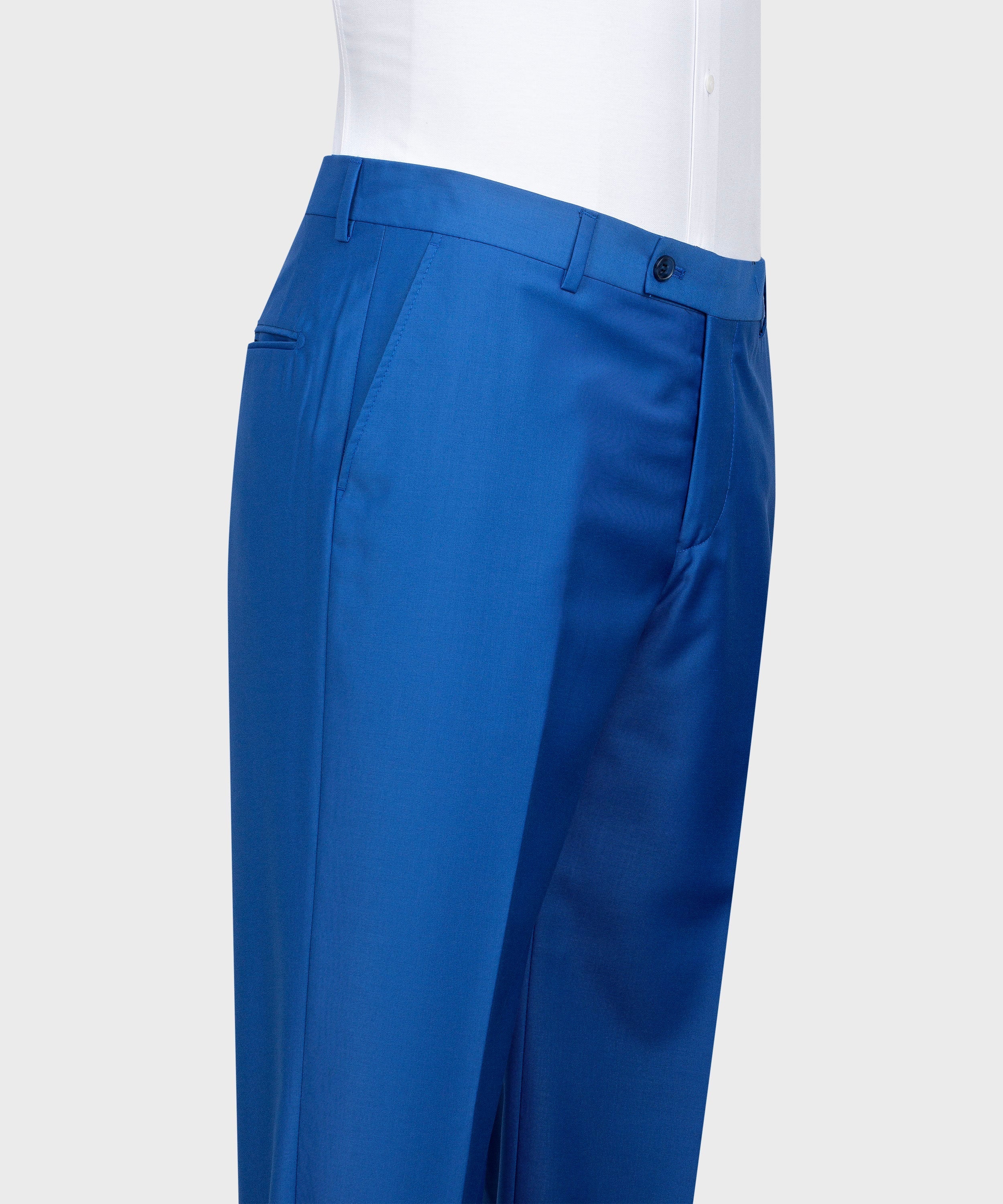Blue dress trousers with belt loops and dark button waistband