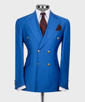 Blue double-breasted suit jacket with gold buttons, white shirt, red patterned pocket square