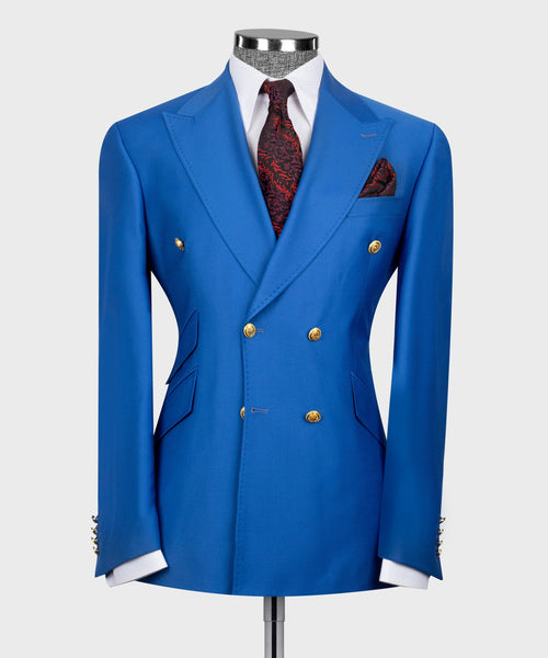 Blue double-breasted suit jacket with gold buttons, white shirt, red patterned pocket square