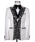 White tuxedo jacket with black stone-embroidered satin lapels and bow tie